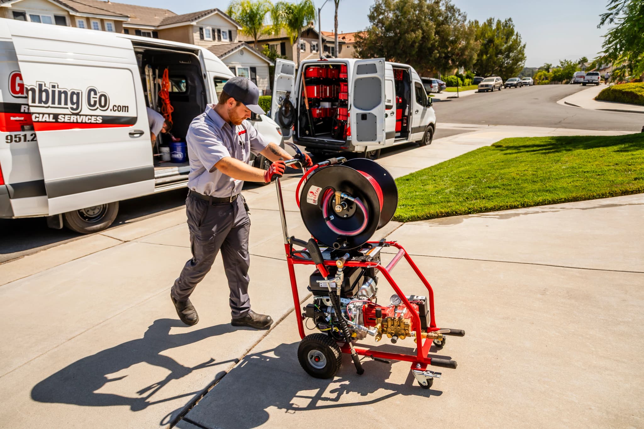 Professional Gardner Plumbing Co. technician with hydro-jetting equipment