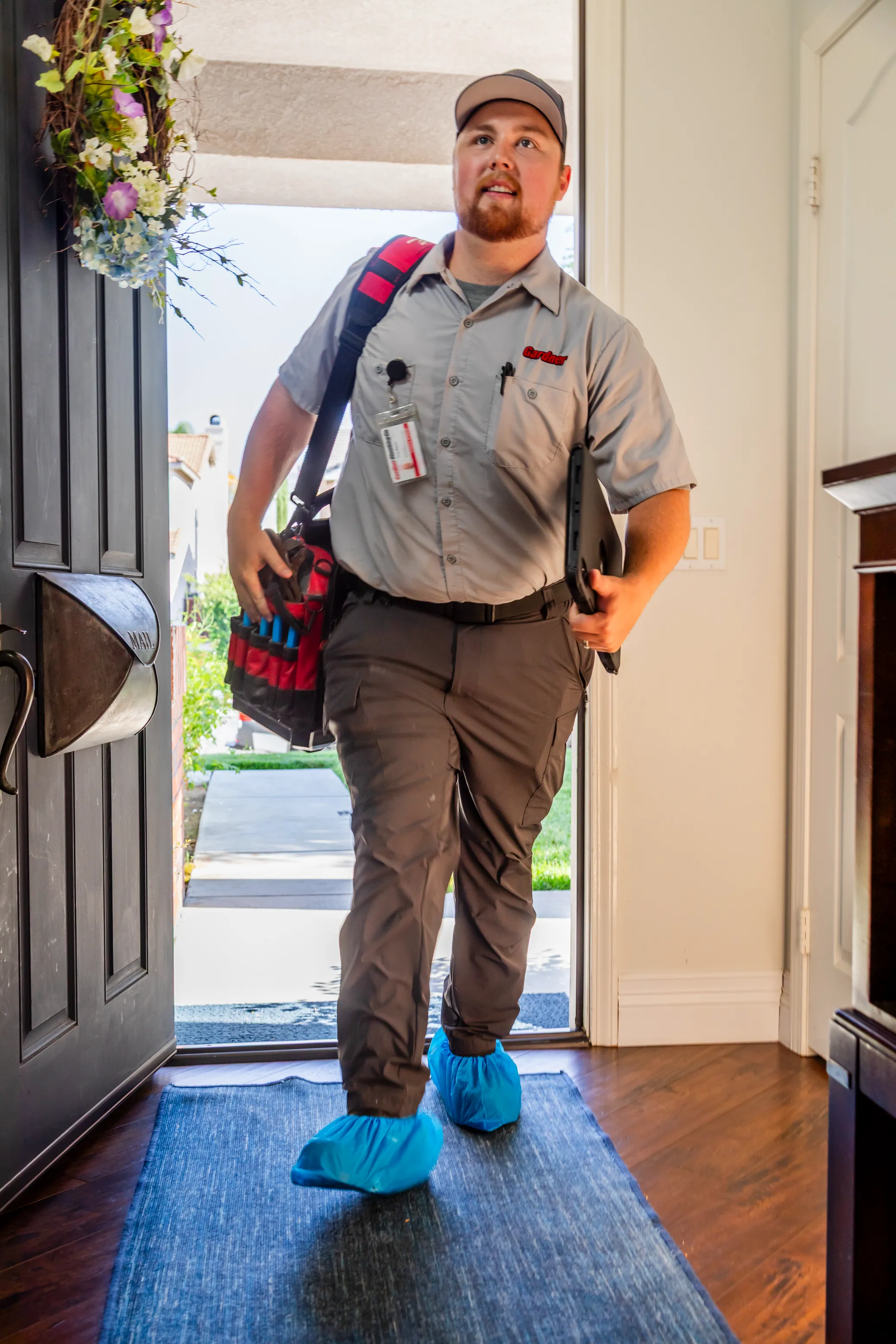 Professional Gardner Plumbing Co. technician with leak detection equipment